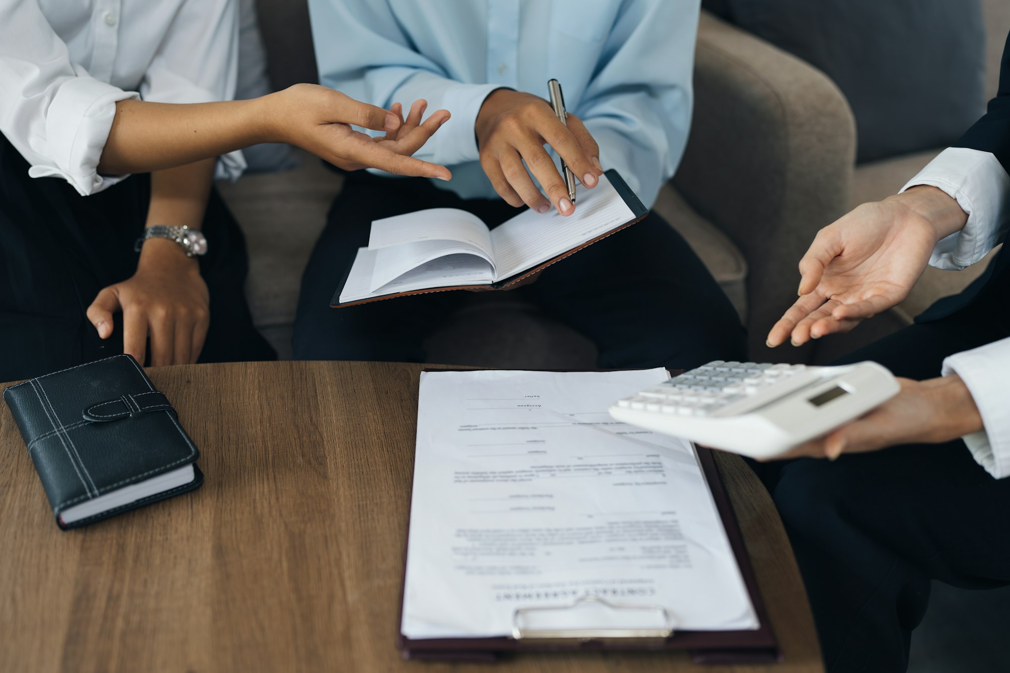 Young couple consultations with a insurance agent. saving and insurance concept